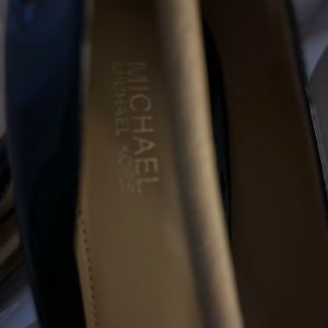 Black peep toe patent leather heels